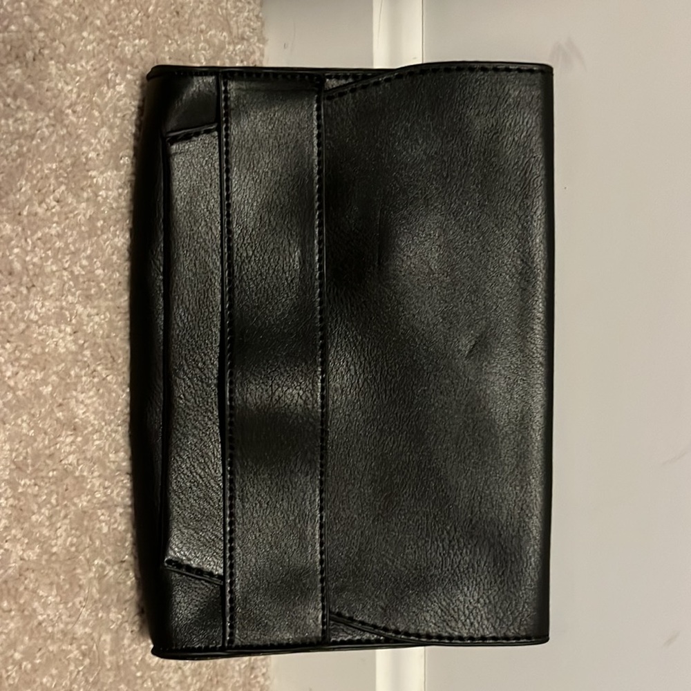 Vegan leather clutch with detachable strap
